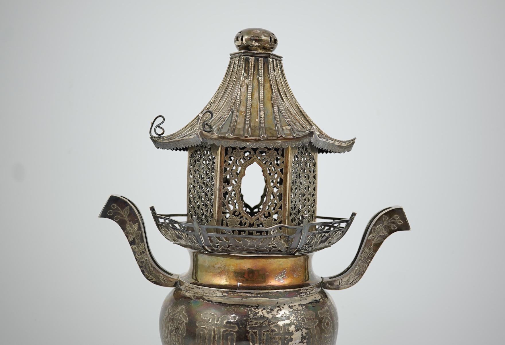 An unusual Chinese silver tripod censer with pagoda shaped cover, ding, early 20th century